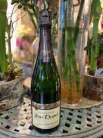 Bonheur pétillant et sa bouteille de champagne